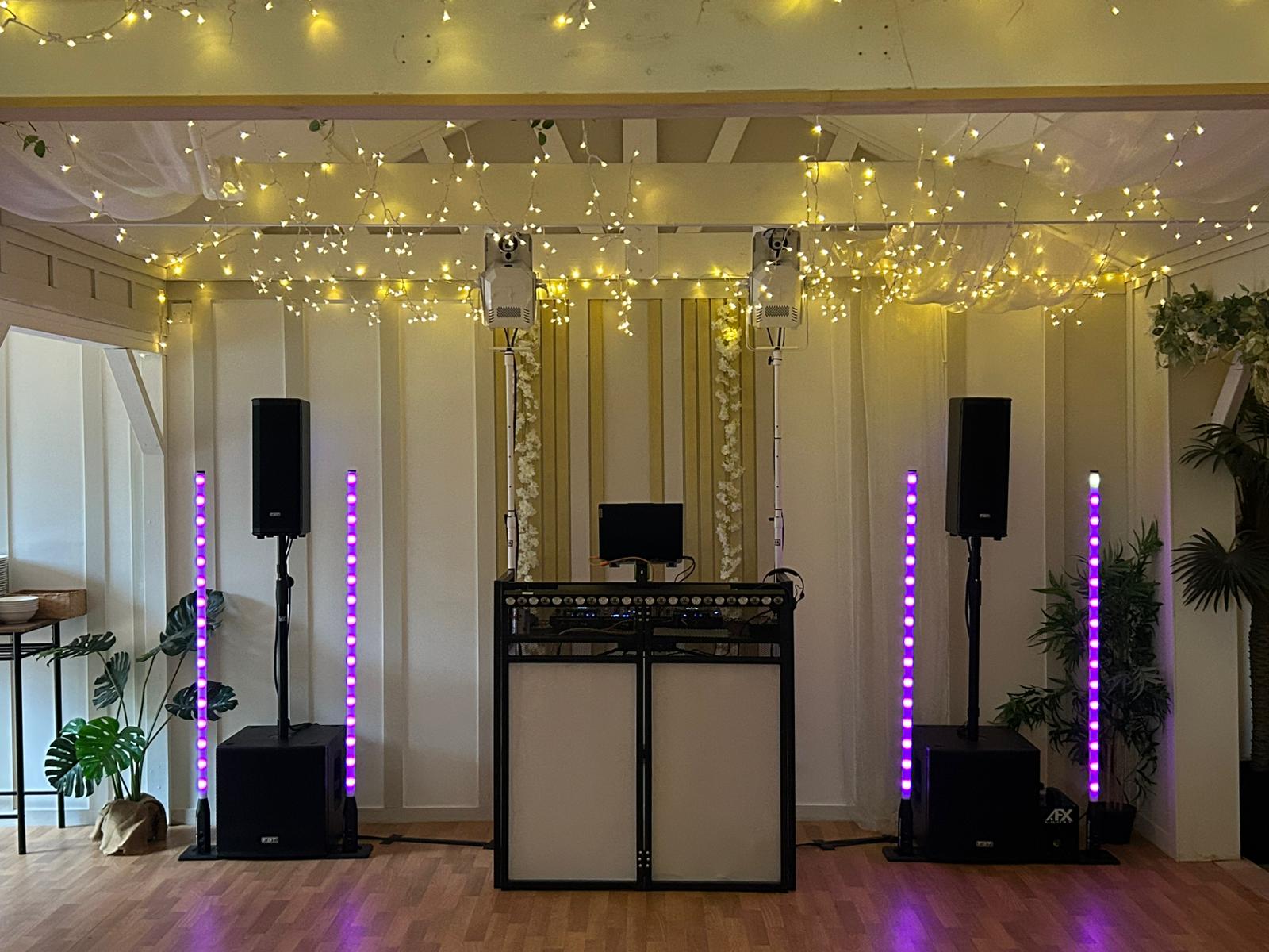 Peachey Events birthday DJ setup with colourful LED lighting